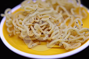 Murukku is a savoury, crunchy snack originating from the Indian subcontinent, popular in southern India. Diwali celebration
