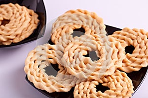 Murukku is a savoury snack from India