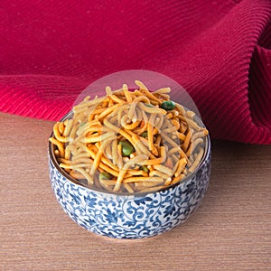 murukku or traditional indian snack on background.