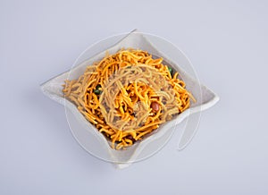 murukku or traditional indian snack chakli and chakali on background.