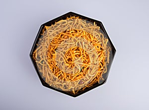 murukku or traditional indian snack chakli and chakali on background.