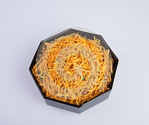 murukku or traditional indian snack chakli and chakali on background.