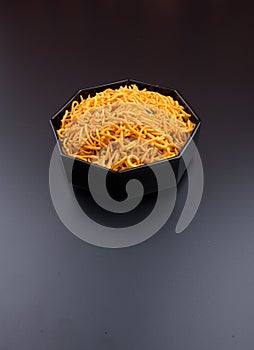 murukku or traditional indian snack chakli and chakali on background.