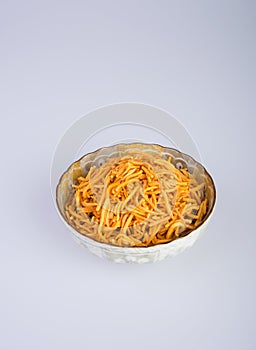 murukku or traditional indian snack chakli and chakali on background.