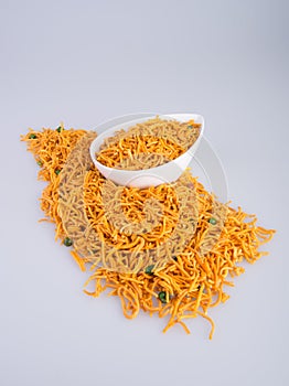 murukku or traditional indian snack chakli and chakali on background.