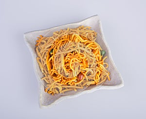 murukku or traditional indian snack chakli and chakali on background.