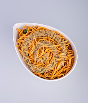 murukku or traditional indian snack chakli and chakali on background.