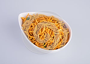 murukku or traditional indian snack chakli and chakali on background.