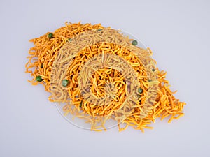 murukku or traditional indian snack chakli and chakali on background.