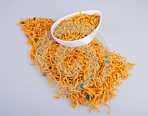 murukku or traditional indian snack chakli and chakali on background.