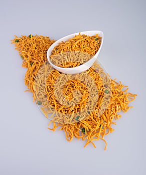 murukku or traditional indian snack chakli and chakali on background.