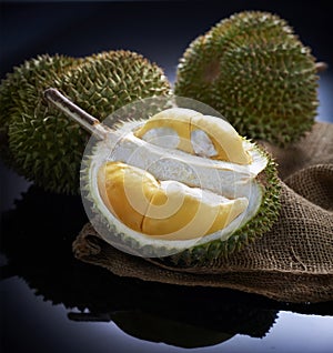 Fresh durian fruit on black background