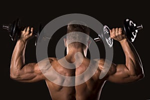 Muscle bodybuilder man lifting weights