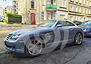 Muscle car Chrysler Crossfire Coupe sporting car parked parked