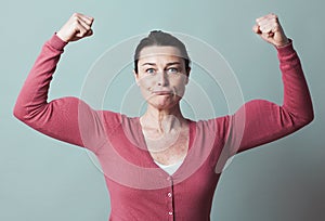 Muscle and female independence metaphor for fun 40s woman