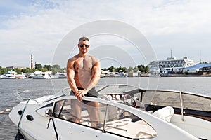 Muscle man on a boat