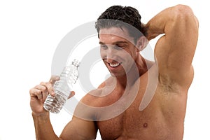 Muscle man drinking water