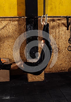 Muscle ups rings man swinging workout exercise at gym