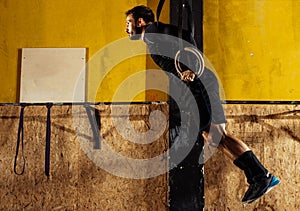 Muscle ups rings man swinging workout exercise at gym