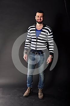 Muscle young man posing in studio