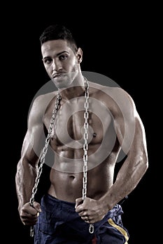 Muscled man on a black background