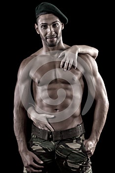 Muscled man on a black background