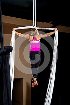 Muscular Aerialist in Tear Drop Iron Cross Pose