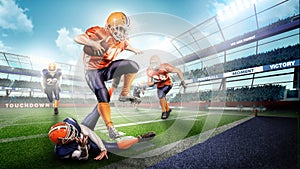 Muscular american football players in the action on stadium