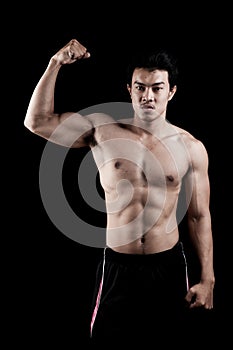 Muscular Asian man show his body