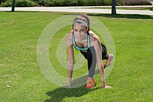 Muscular athlete preparing to run