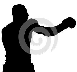 Muscular athlete, professional boxer beats a boxing jab straight punch beats volerkraft with boxing gloves. silhouette