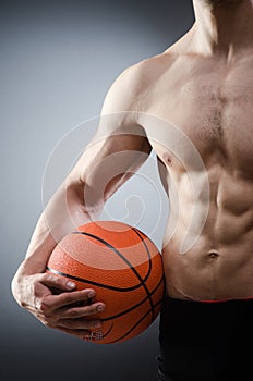 Muscular basketball in sports concept