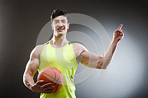 Muscular basketball in sports concept