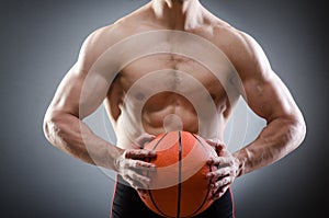 Muscular basketball in sports concept