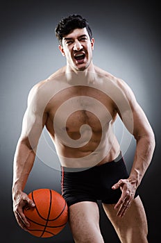 Muscular basketball in sports concept