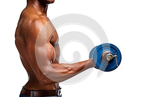 Muscular black man lifting gym weight bicep exercise