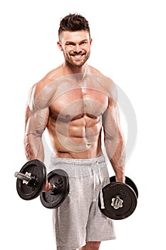 Muscular bodybuilder guy doing exercises with big dumbbell