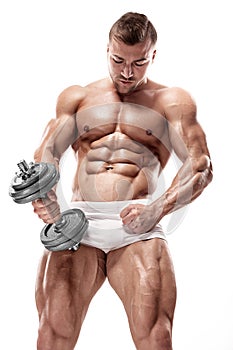 Muscular bodybuilder guy doing exercises with big dumbbell