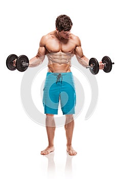 Muscular bodybuilder guy doing exercises with dumbbells