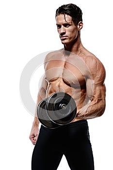 Muscular bodybuilder guy doing exercises with dumbbells