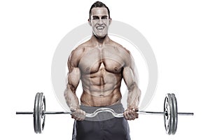 Muscular bodybuilder guy doing exercises with dumbbells over white background