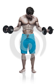 Muscular bodybuilder guy doing exercises with dumbbells over white background