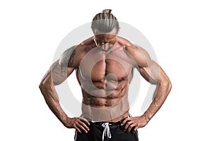 Muscular Bodybuilder Guy Posing Over White Background