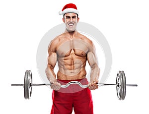 Muscular bodybuilder Santa Claus doing exercises with dumbbells
