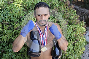 Muscular boxer winning a prize