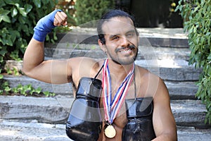 Muscular boxer winning a prize