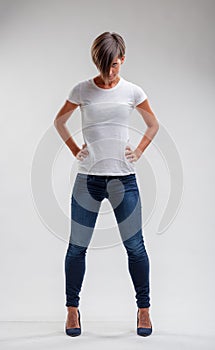 Muscular fit woman in denim jeans