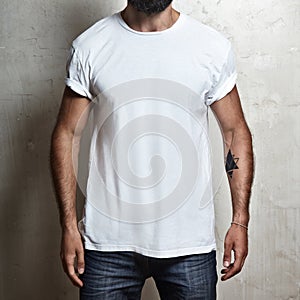 Muscular guy wearing white t-shirt