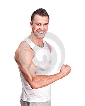 Muscular handsome man posing in studio