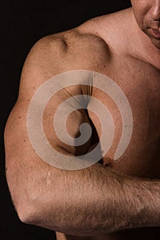 Muscular male arm